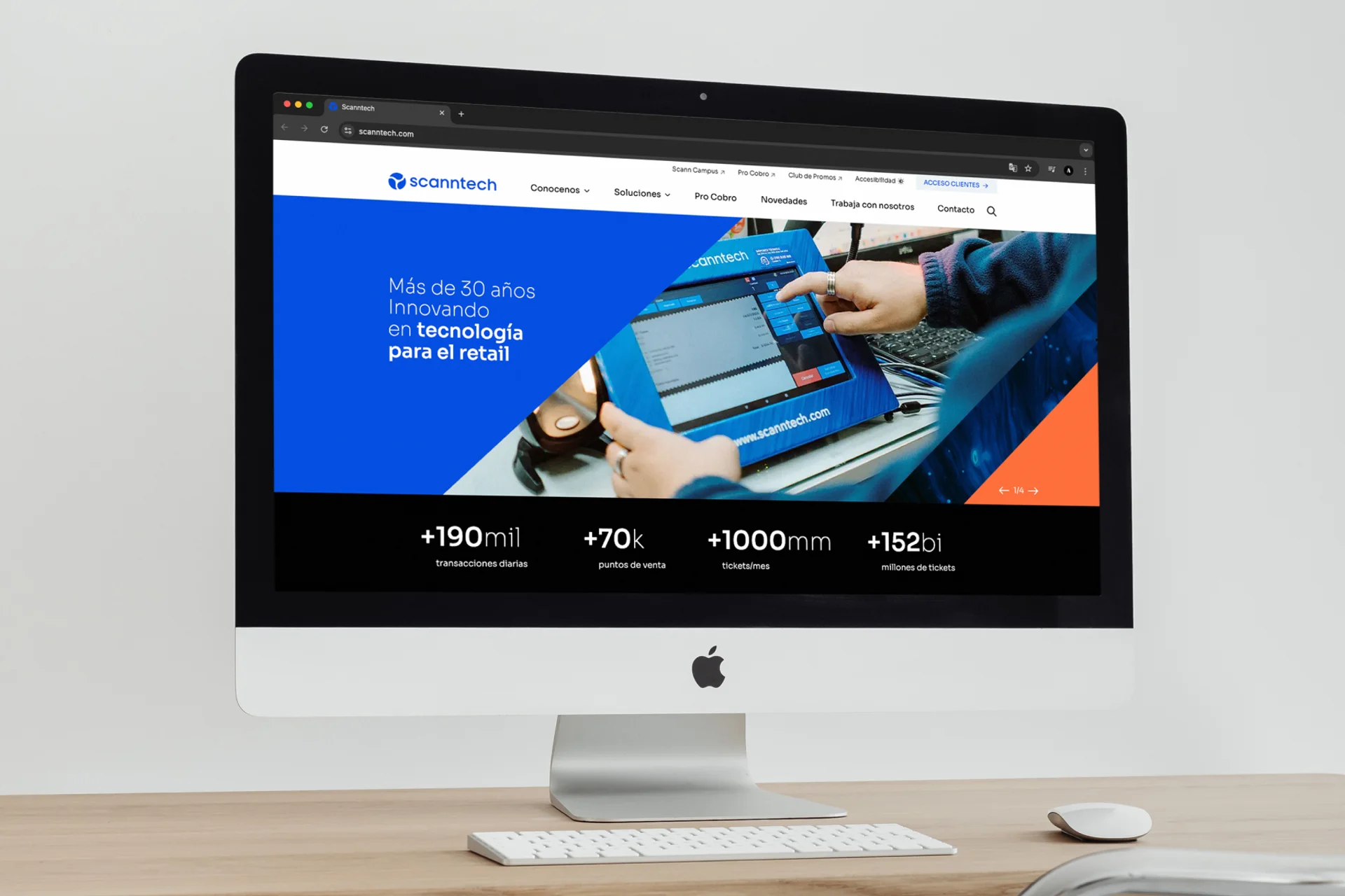 Computador apresentando na tela o novo site institucional da Scanntech Uruguai, desenvolvido pela BASE Digital.